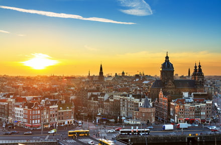Hire a car and have a great view on Amsterdam during sunset